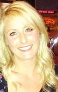Darlene, smiling, with long blonde hair